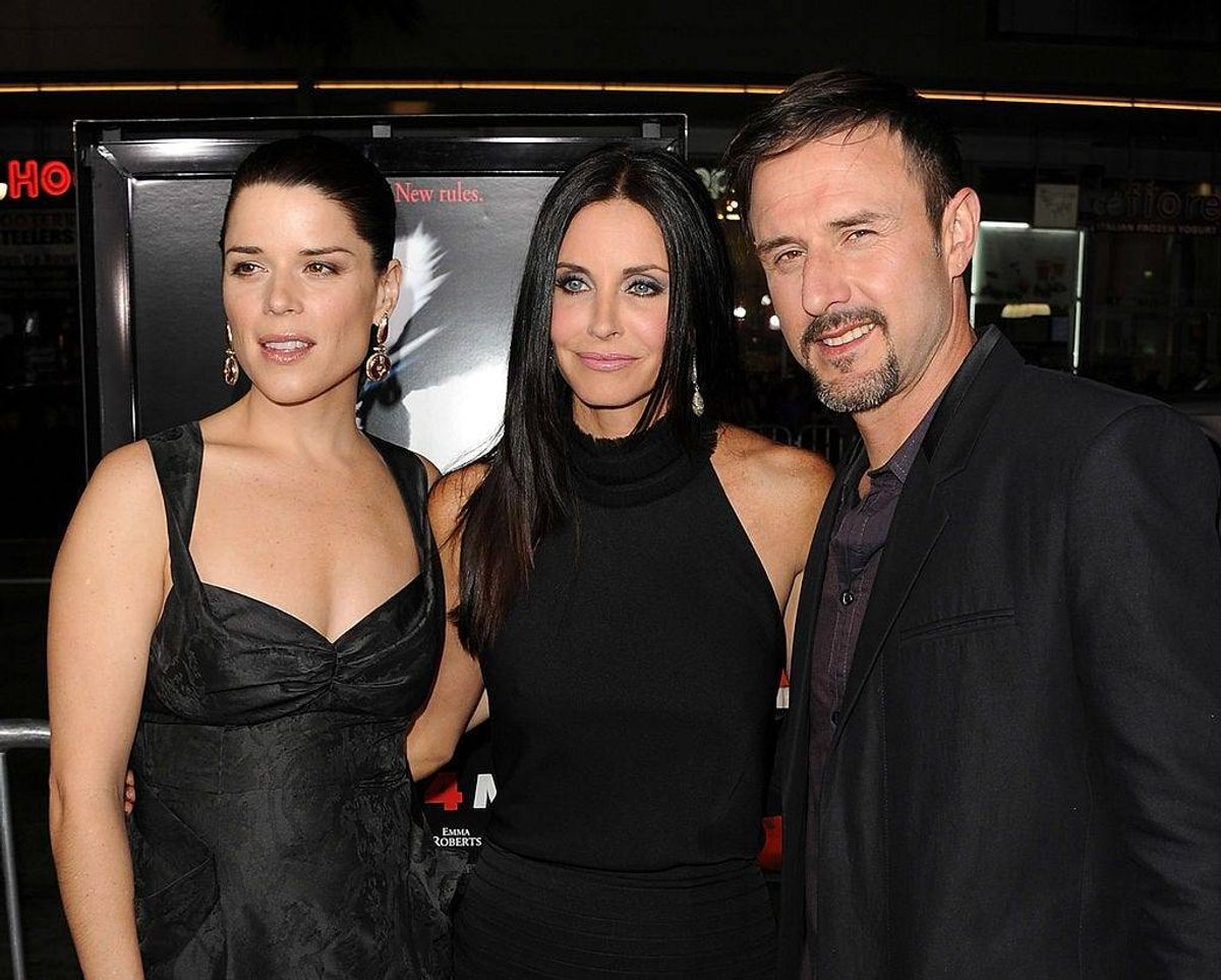 Neve Campbell, Courteney Cox, and David Arquette arrive at the premiere of The Weinstein Company's "Scream 4" Presented by AXE Shower held at Grauman's Chinese Theatre on April 11, 2011 in Hollywood, California