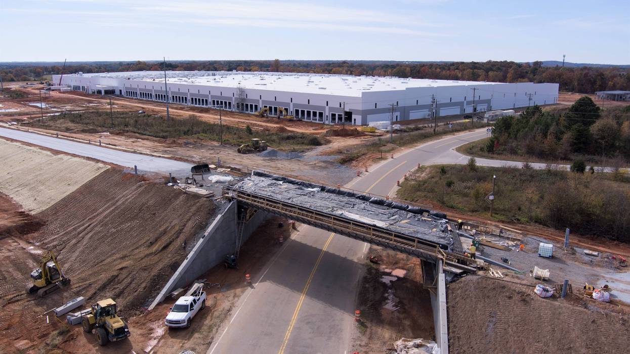New BMW Logistics Center with Freeman Farm Road bridge under construction.