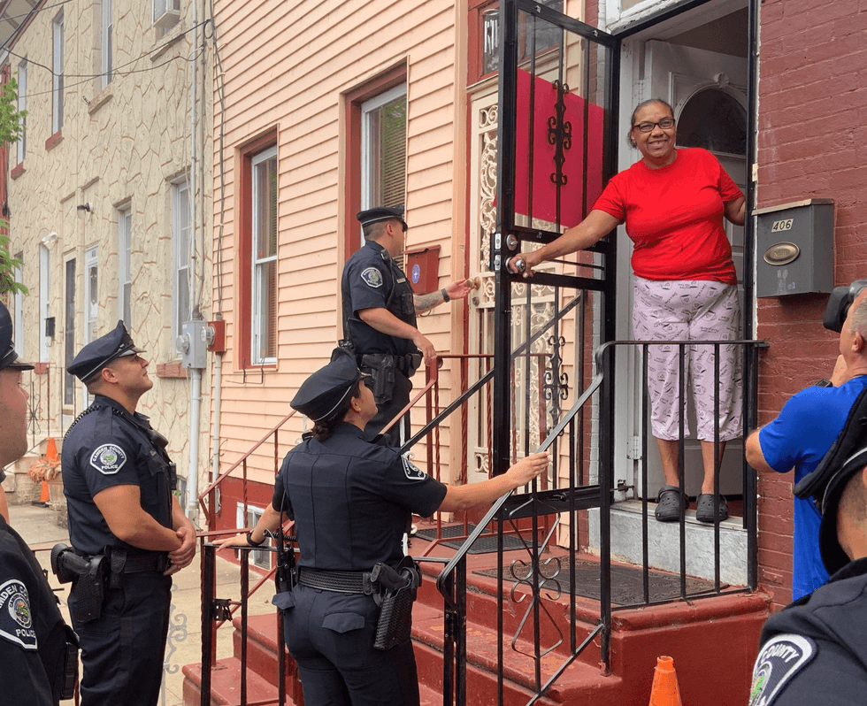 New Camden County Police officers meeting residents after being sworn in.