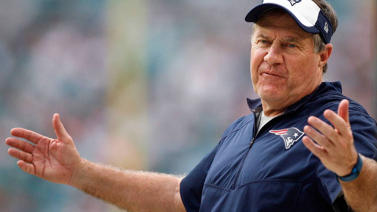 New England Patriots head coach Bill Bellichick coach gestures between plays in the second half against the Miami Dolphins at Sun Life Stadium. The Dolphins defeated the Patriots 20-10.