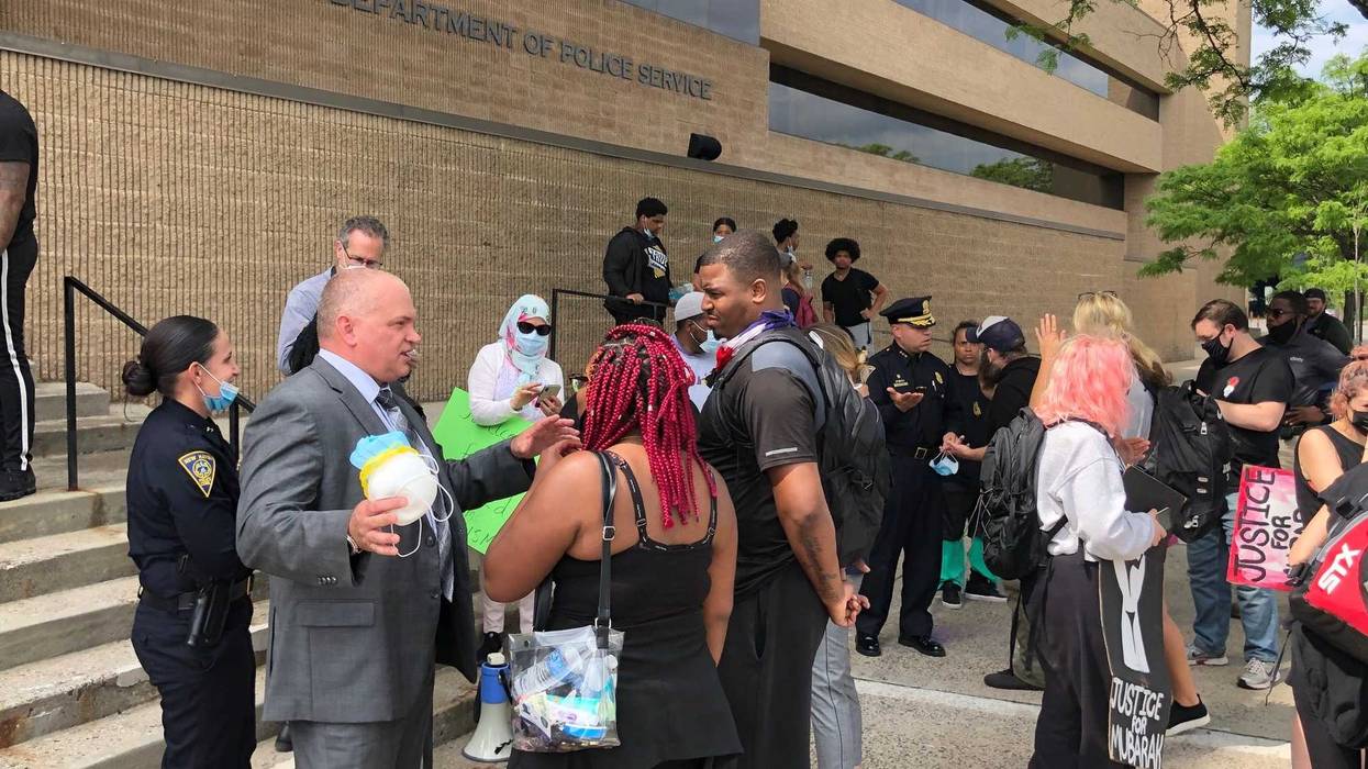 New Haven Assistant Police Chief Karl Jacobson (L, in suit) meets with city residents, 6/3/20 (Jacobson became police chief in July, 2022)