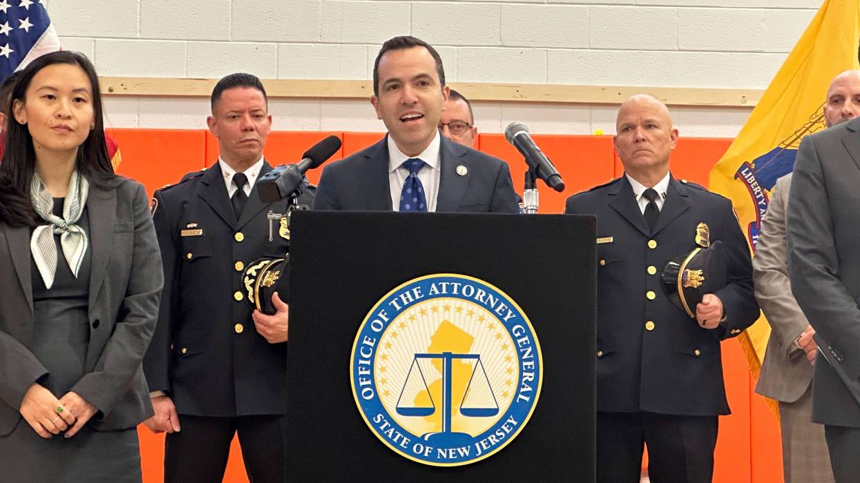 New Jersey Attorney General Matt Platkin announces he and Minnesota Attorney General Keith Ellison are suing Glock gun manufacturer to get them to stop selling guns that can be modified with a switch to turn into a machine gun like weapon, Dec. 12, 2024, in Newark, N.J.