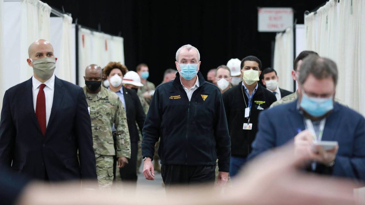 New Jersey Governor Phil Murphy and New Jersey Senator Cory Booker tour the field hospital in Edison, N.J. on Wednesday, April 8, 2020.