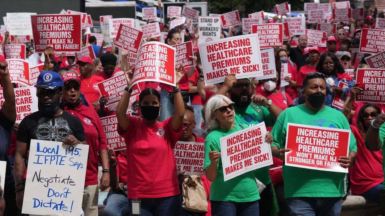 New Jersey public employees protesting a raise in the costs of their health care benefits outside the statehouse annex in Trenton, New Jersey on Sept. 13, 2022.