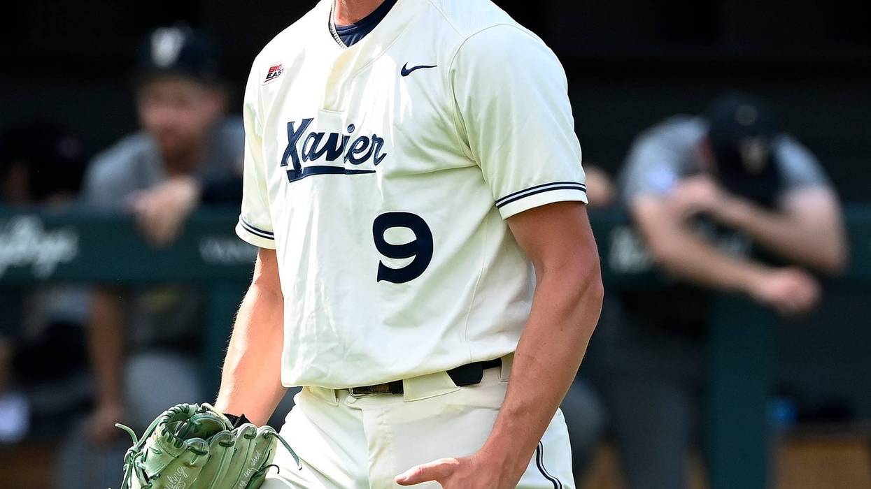 New LSU pitcher Justin Loer (9) celebrates last season when he was with Xavier