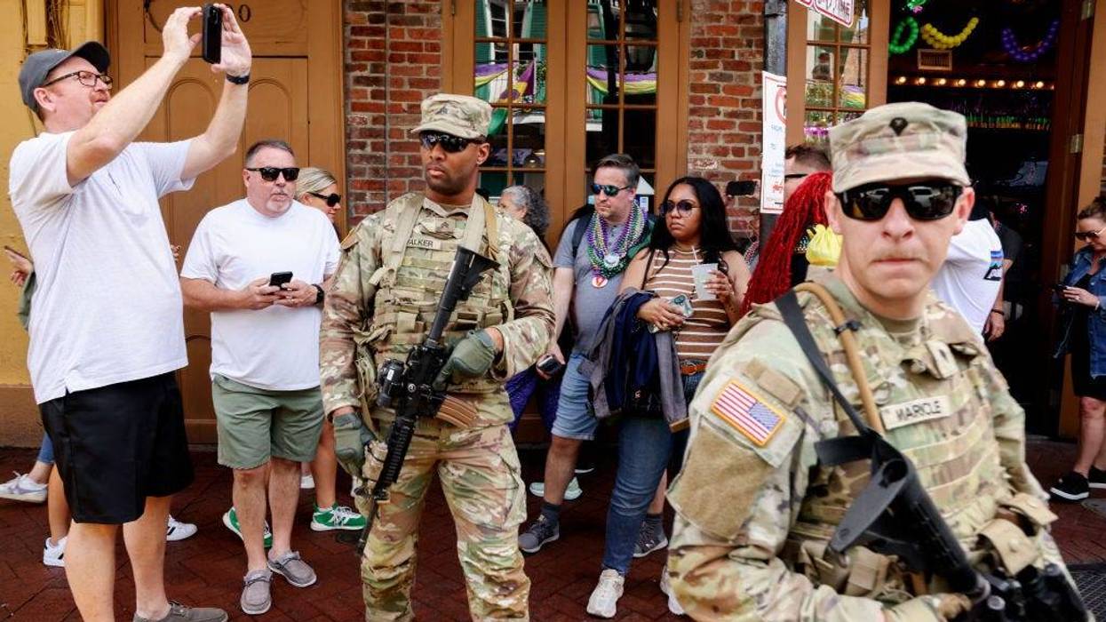 NEW ORLEANS, LOUISIANA - FEBRUARY 8: Members of the National Guard patrol in the French Quarter along Bourbon Street on February 8, 2025 in New Orleans, Louisiana. Security has increased around New Orleans as the National Guard and several other law enforcement agencies have been deployed ahead of Super Bowl LIX following a New Year’s Day terror attack on Bourbon Street that left 14 people dead.