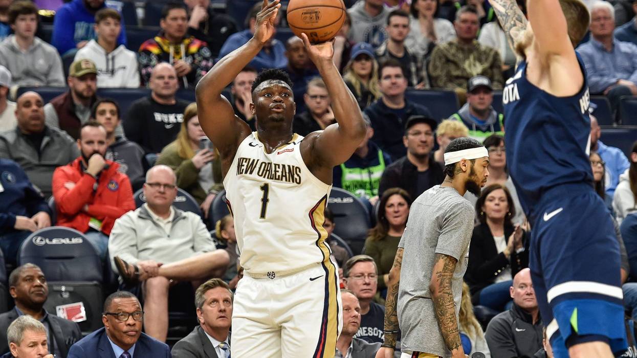 New Orleans Pelicans forward Zion Williamson (1) shoots the ball as Minnesota Timberwolves guard Jaylen Nowell (4) defends during the second quarter at Target Center.
