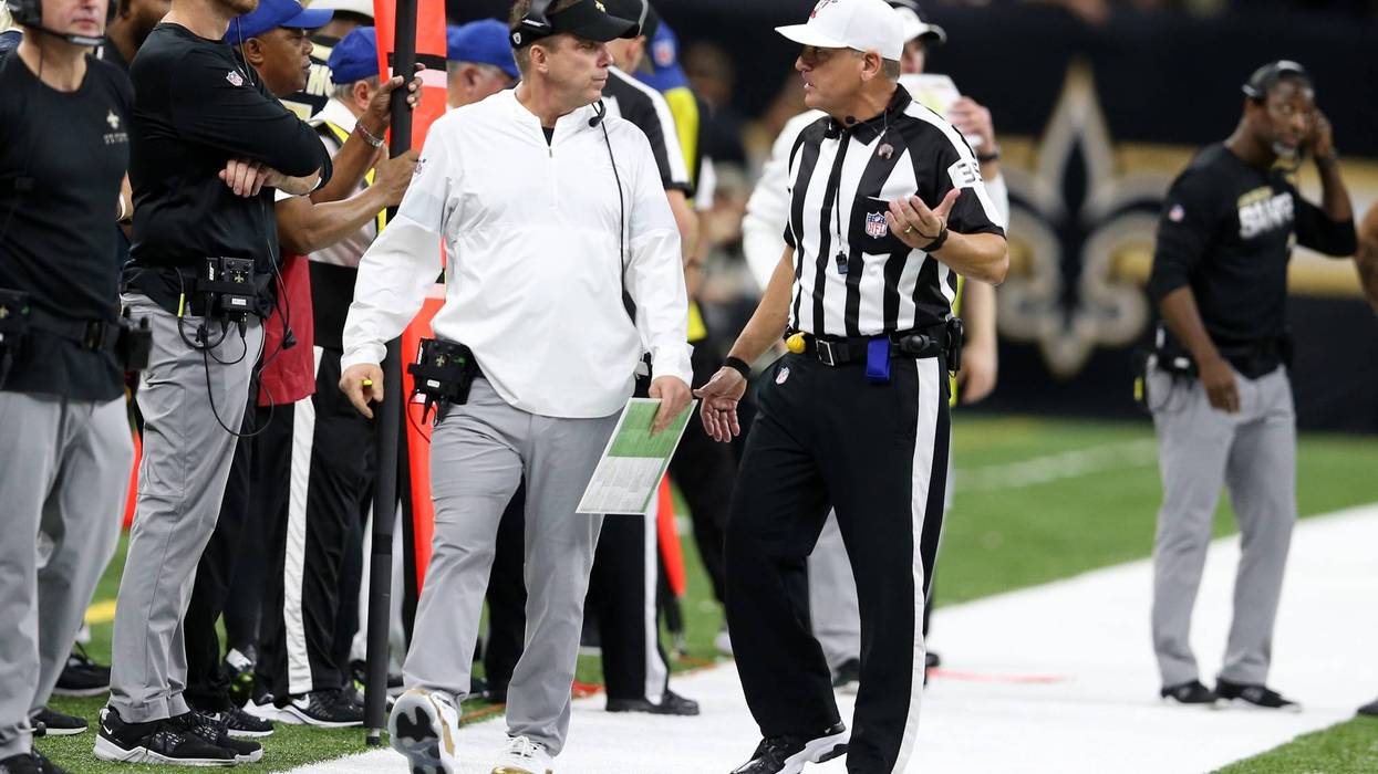 New Orleans Saints head coach Sean Payton (left) reacts after a call by referee John Hussey (35) in the second half against the San Francisco 49ers at the Mercedes-Benz Superdome.