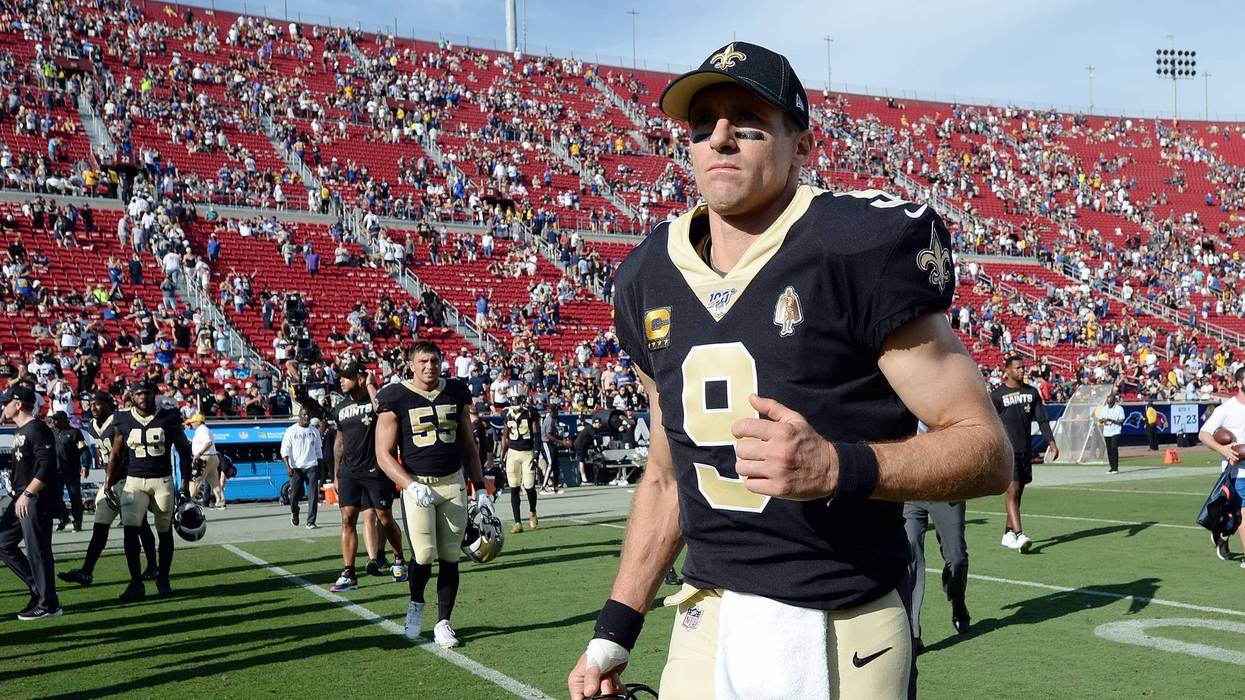 New Orleans Saints quarterback Drew Brees (9) leaves the field following the 27-9 loss against the Los Angeles Rams at Los Angeles Memorial Coliseum.