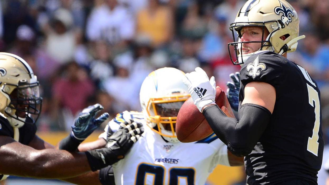 New Orleans Saints quarterback Taysom Hill (7) looks to pass during the second quarter against the Los Angeles Chargers at Dignity Health Sports Park.