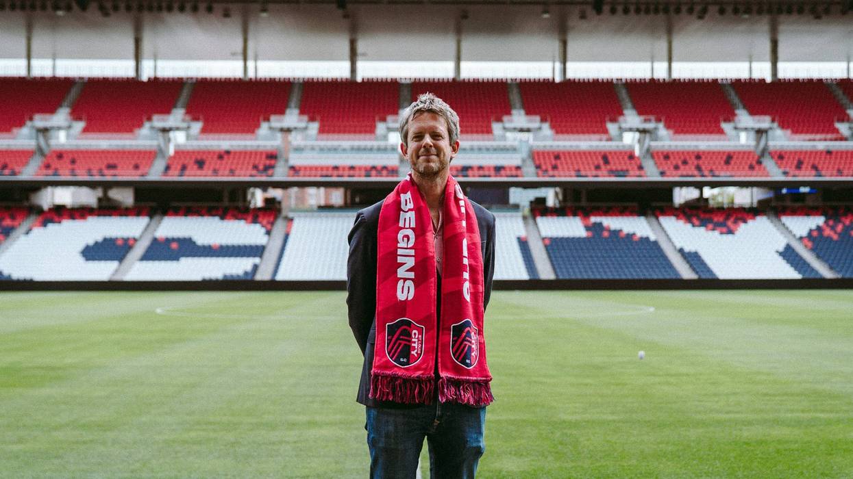 New St. Louis City S.C. President/CEO Diego Gigliani standing on the pitch at City Park