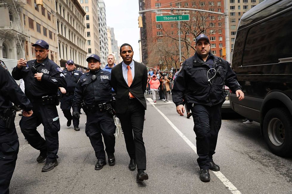 New York City Council Member Ritchie Torres is arrested with other activists at a rally demanding that the Trump administration abandon proposals to cut the Housing and Urban Development
