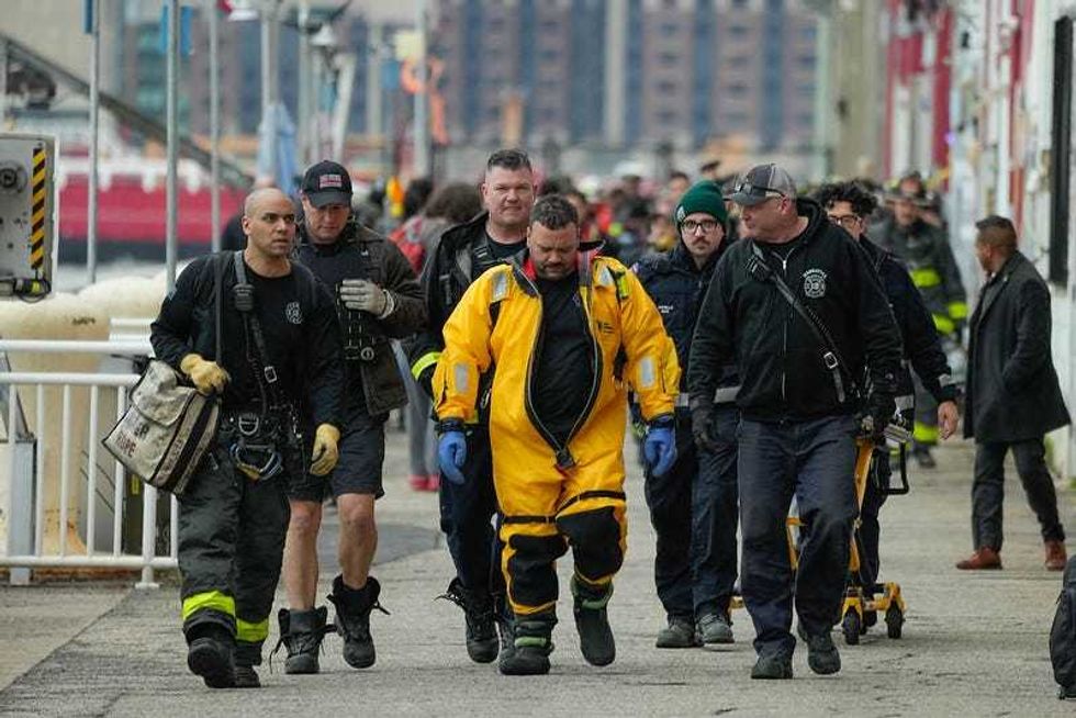 New York City first responders on the scene after a helicopter crash on the Hudson River on Thursday, April 10, 2025.