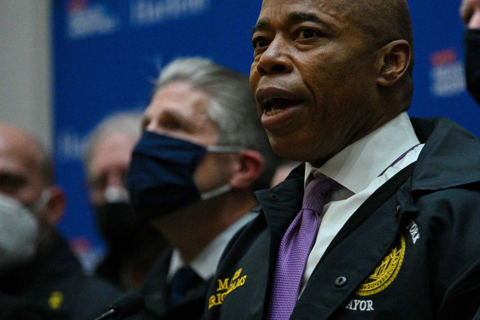 New York City Mayor Eric Adams speaks to members of the media at Harlem Hospital on January 21, 2022 in New York City. One officer was killed and the other remains in critical condition at Harlem Hospital. The officers were shot while responding to a domestic violence call near the 32nd precinct in Harlem.