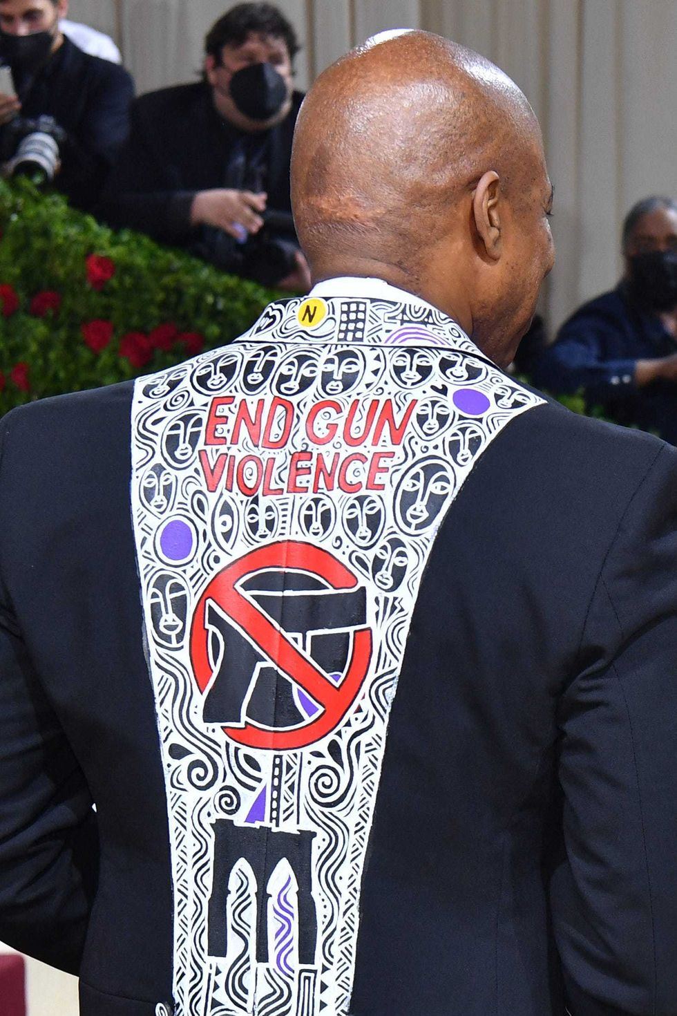 New York City Mayor Eric Adams, wearing a jacket with "End Gun Violence", arrives for the 2022 Met Gala at the Metropolitan Museum of Art on May 2, 2022, in New York. - The Gala raises money for the Metropolitan Museum of Art