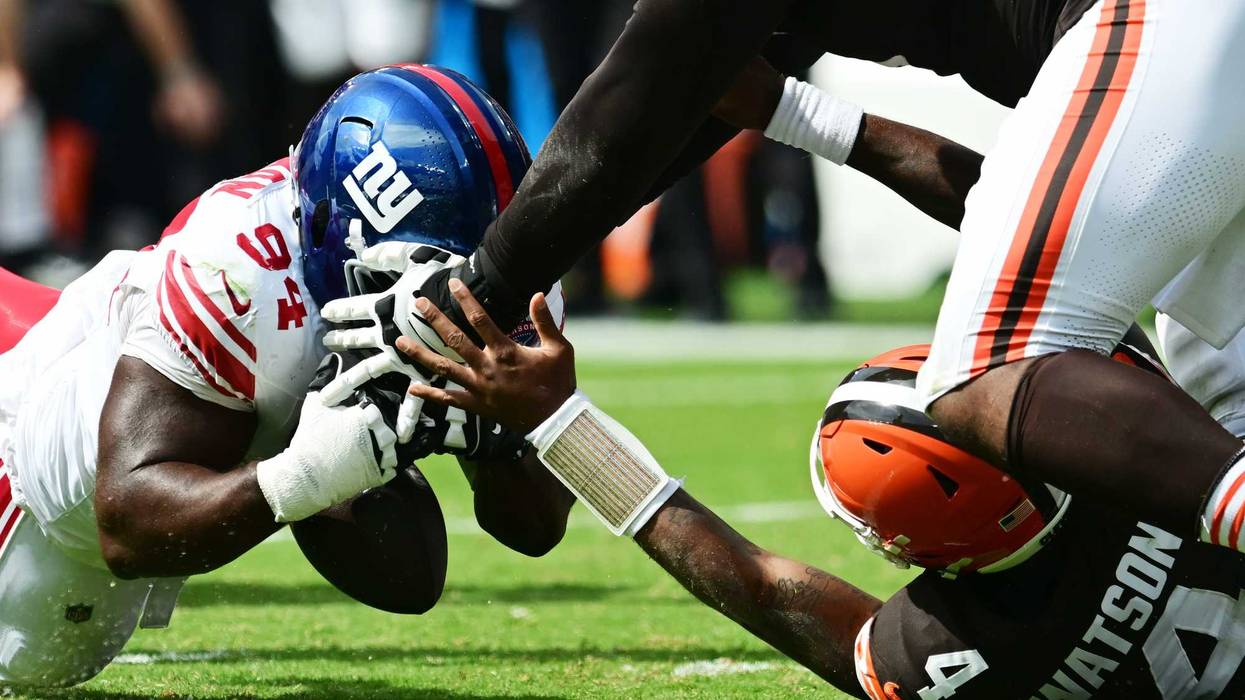 New York Giants defensive tackle Elijah Chatman (94) recovers a fumble by Cleveland Browns quarterback Deshaun Watson (4) during the first half at Huntington Bank Field.