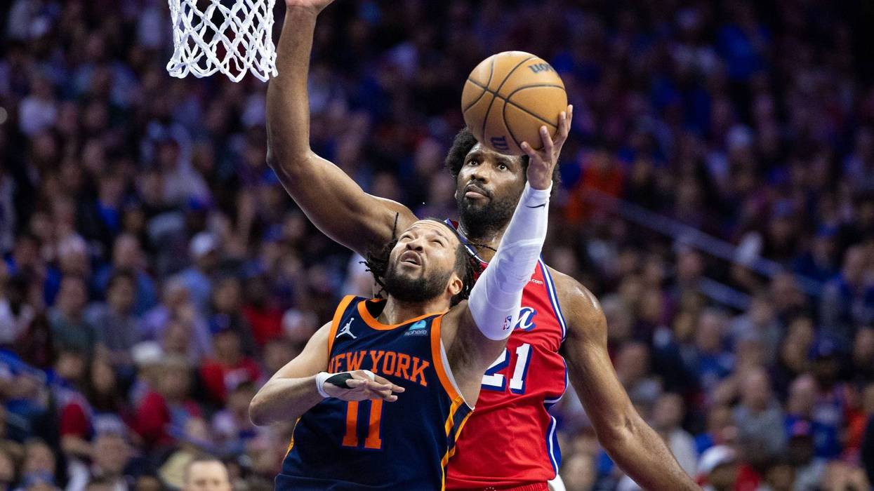 New York Knicks guard Jalen Brunson drives against Philadelphia 76ers center Joel Embiid during the second half of Game Four of the first round in the 2024 NBA playoffs at Wells Fargo Center.