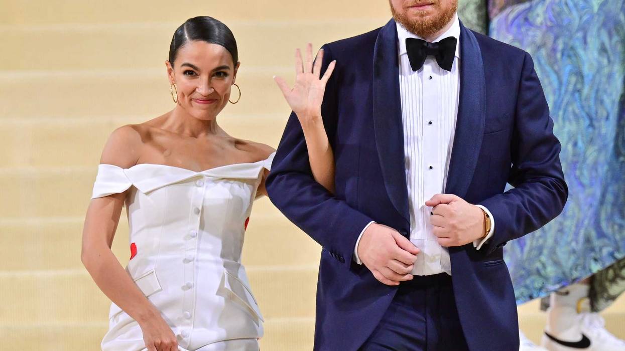 NEW YORK, NEW YORK - SEPTEMBER 13: Alexandria Ocasio-Cortez and Riley Roberts leave the 2021 Met Gala Celebrating In America: A Lexicon Of Fashion at Metropolitan Museum of Art on September 13, 2021 in New York City. (Photo by James Devaney/GC Images)