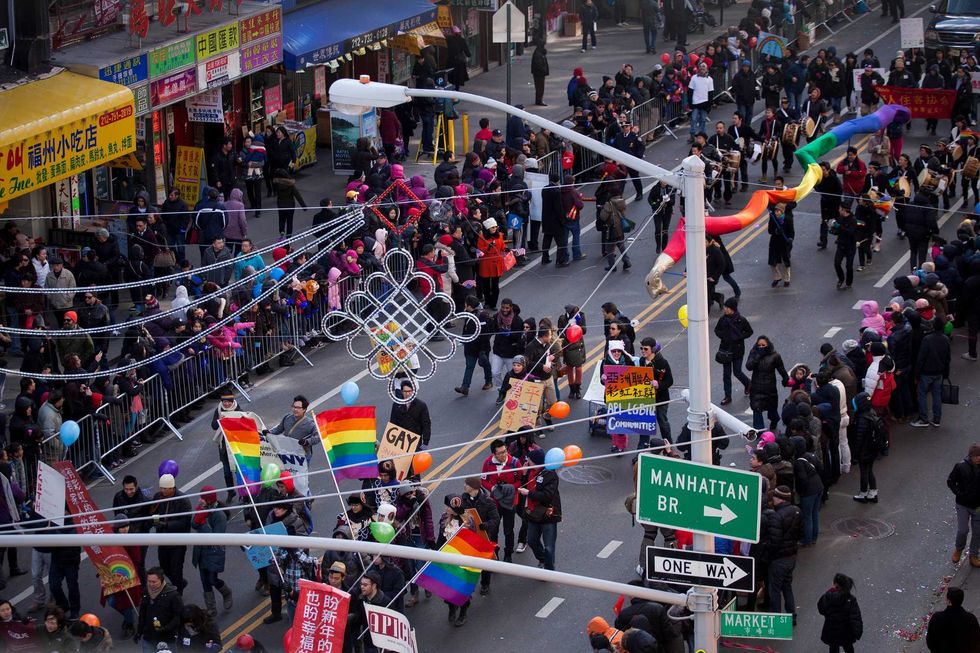 NEW YORK, NY - FEBRUARY 17: Supporters of Asian Pacific Islander LGBT Communities march with a rainbow-colored snake through New York