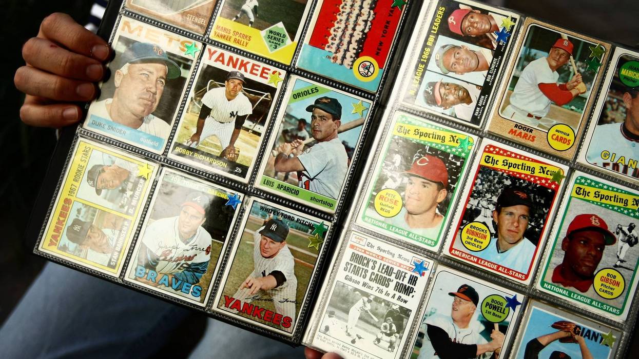 NEW YORK - SEPTEMBER 21: A man sells vintage baseball cards prior to the start of the last game at Yankee Stadium between the Baltimore Orioles and the New York Yankees on September 21, 2008 at Yankee Stadium in the Bronx borough of New York City. Yankee Stadium held it's inaugural game on April 18, 1923 against the Boston Red Sox and tonight's match will be the final game to be played at the historic stadium. During it's 85 years as ''The Home of Champions,'' the stadium has also been known as ''The House that Ruth Built'' and ''The Cathedral.'' The stadium has been host to 33 World Series, three Papal visits and has been visited by legends such as Babe Ruth, Joe DiMaggio, Yogi Bera, Mickey Mantle and boxing great Muhummad Ali. In 2009 the Yankees will move across the street to a newly constructed stadium estimated to cost $1.3 billion.