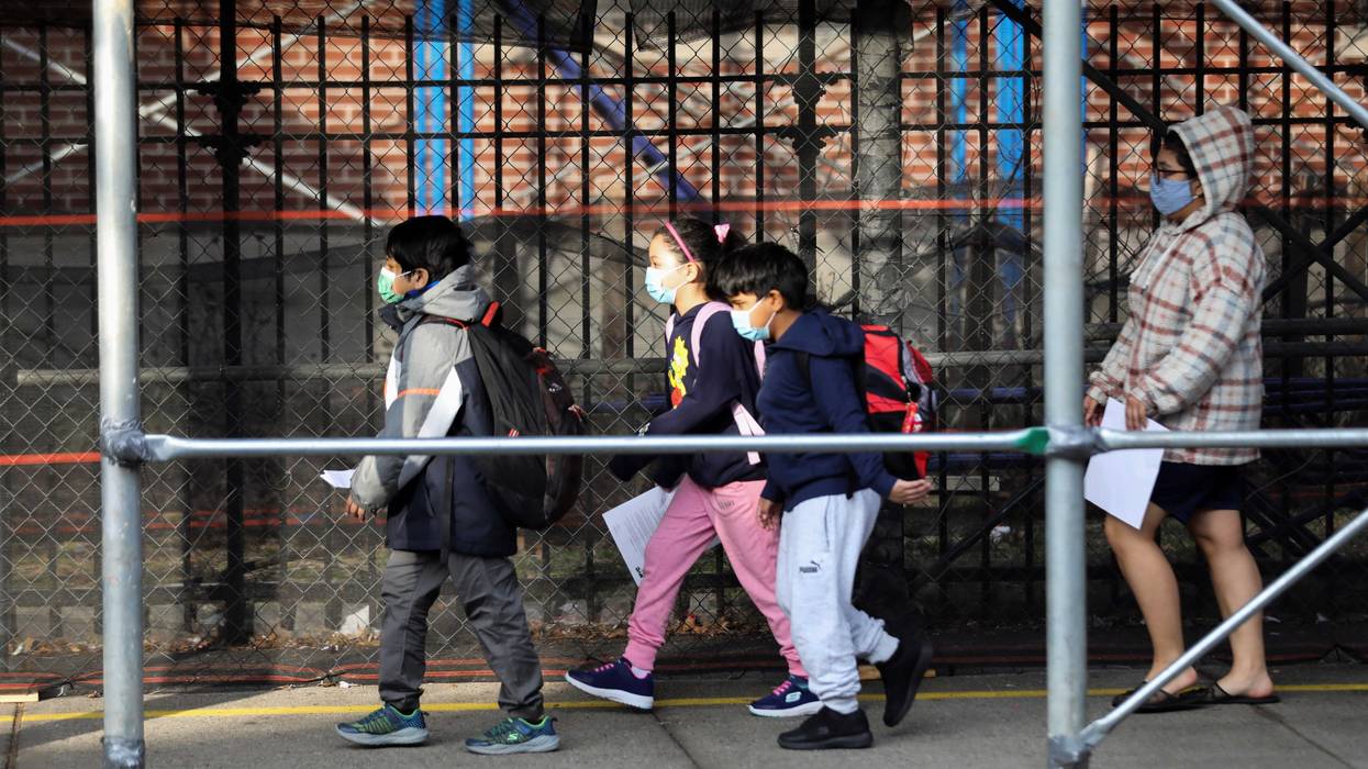 New York state is recommending children wear masks again while indoors at school as a "tripledemic" looms this winter
