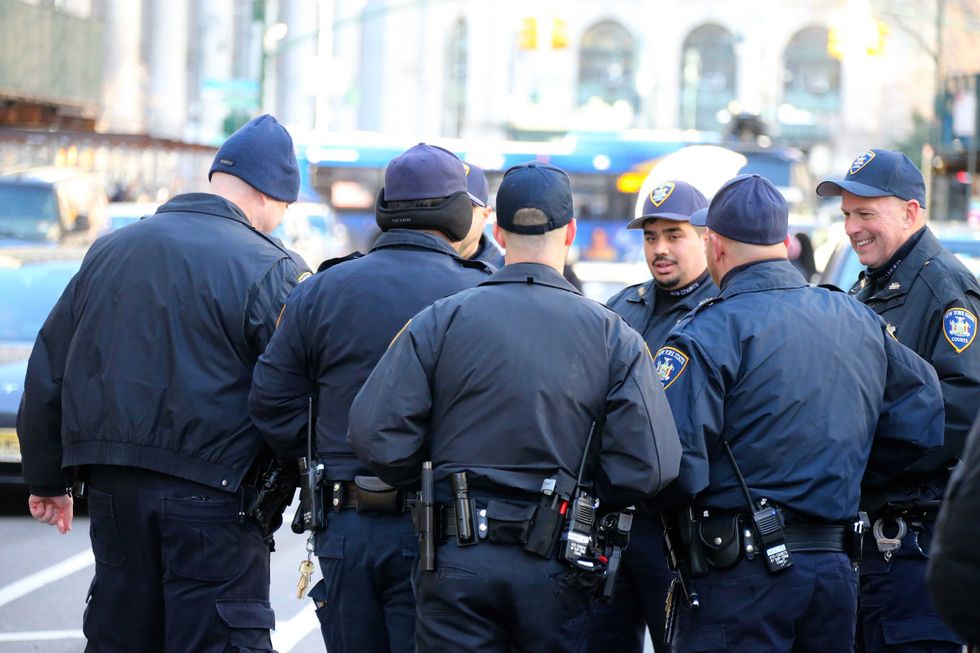 New York State police gather near Manhattan Criminal Court on March 20, 2023
