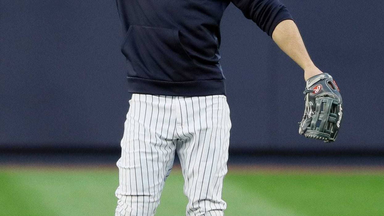 New York Yankees left fielder Giancarlo Stanton warms up during batting practice before Game 4 of baseball's American League Championship Series against the Houston Astros Thursday, Oct. 17, 2019, in New York.