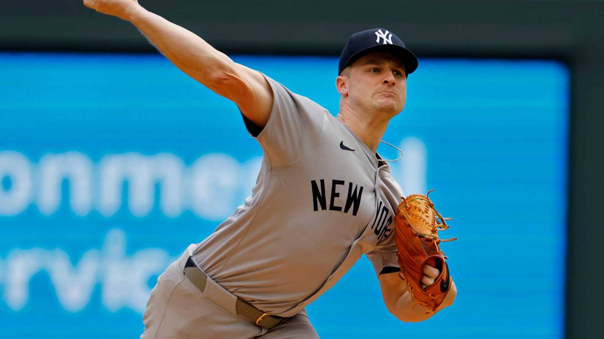 New York Yankees starting pitcher Clarke Schmidt throws to the Minnesota Twins in the first inning of a baseball game Thursday, May 16, 2024, in Minneapolis.