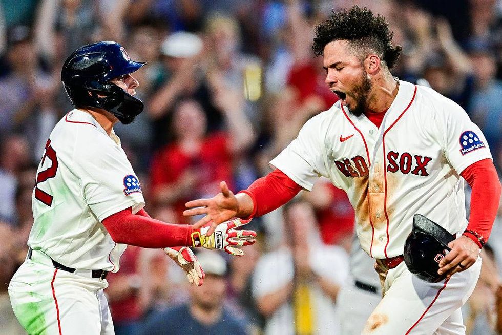 It was a night baseball and life converged at Fenway Park