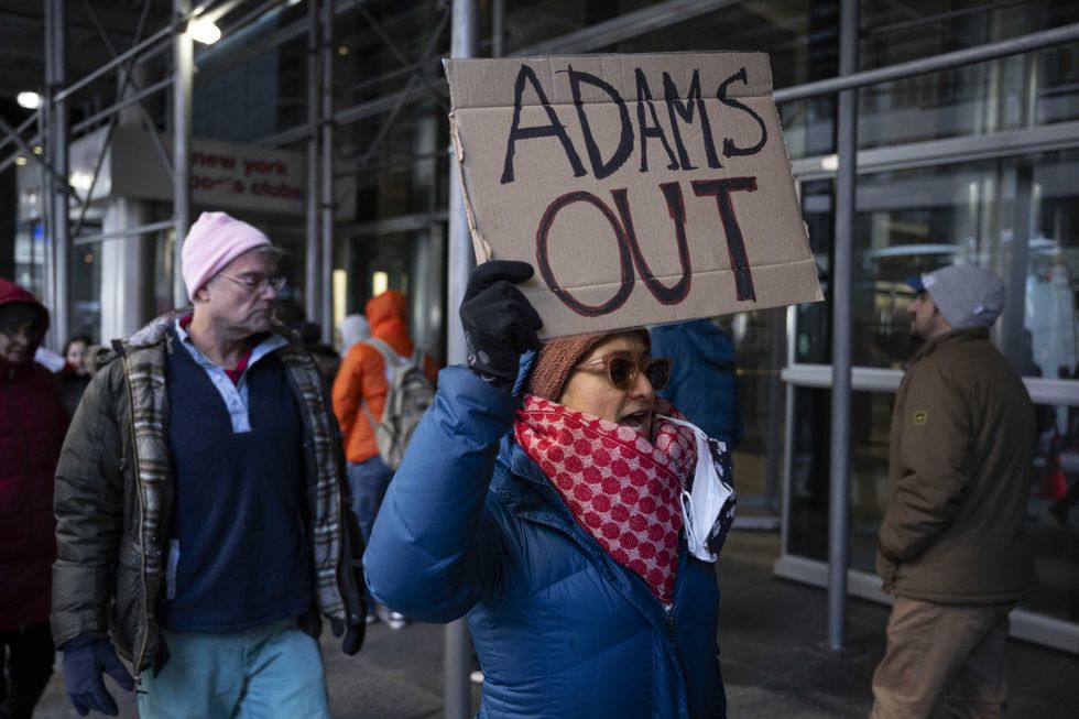 New Yorkers picket to urge Governor Kathy Hochul to remove Mayor Eric Adams as she meets with top Democratic leaders to discuss Adam