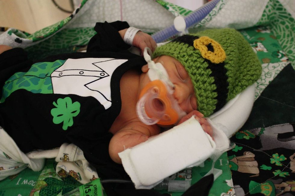 Newborn dressed for St. Patrick