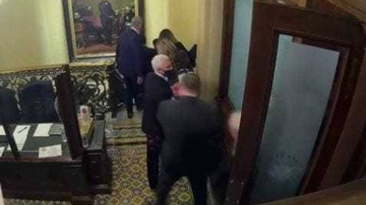 Newly released surveillance video shows VP Mike Pence being moved to safety as nearby rioters threatened his life, 1/6/21.