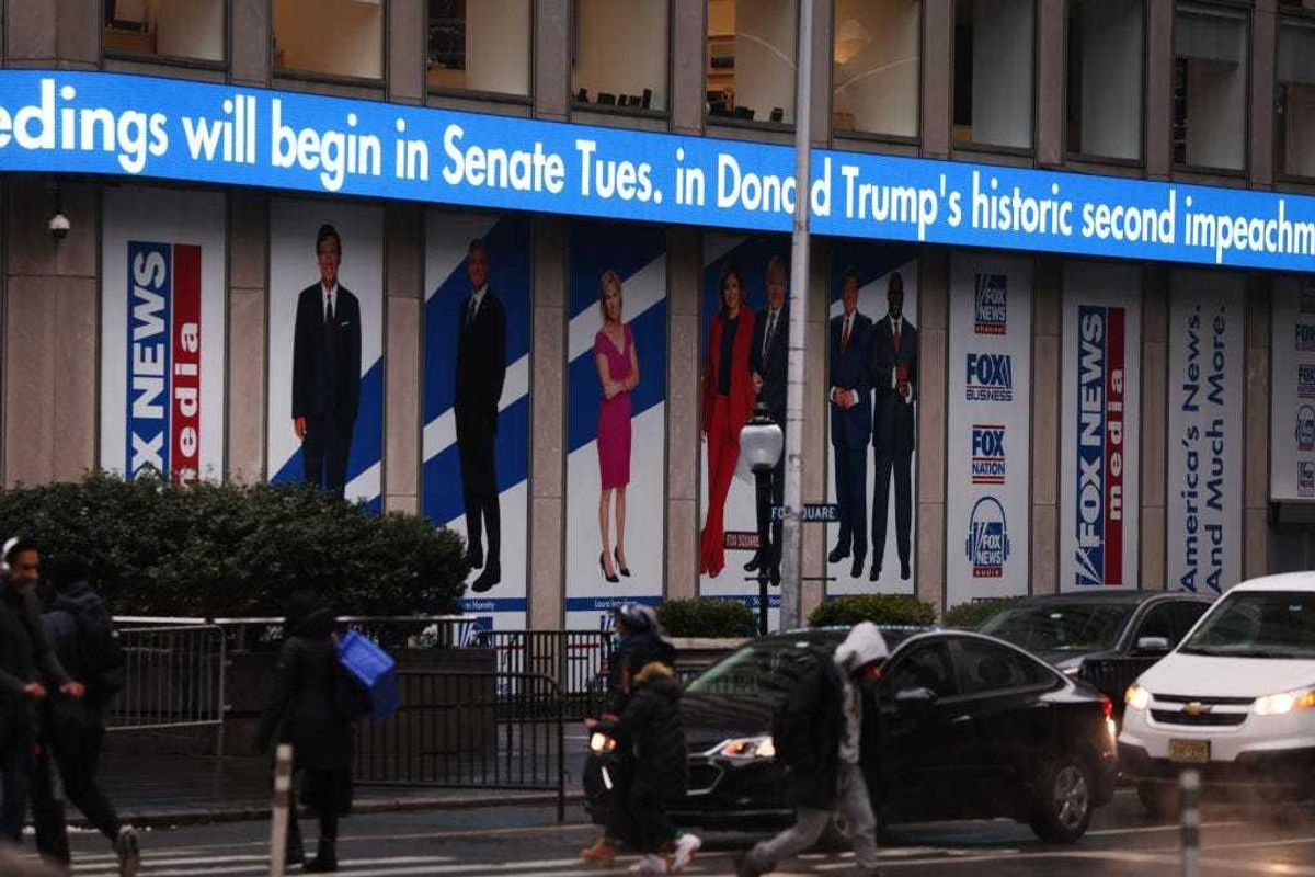 News headlines on the impeachment trial of Donald Trump are displayed outside of the Fox headquarters on February 09, 2021 in in New York City.