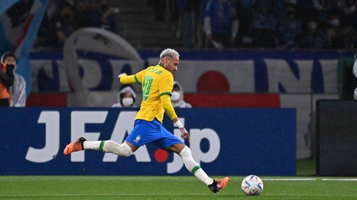 Neymar Jr. of Brazil takes a free kick during the international friendly match between Japan and Brazil at National Stadium on June 6, 2022 in Tokyo, Japan.