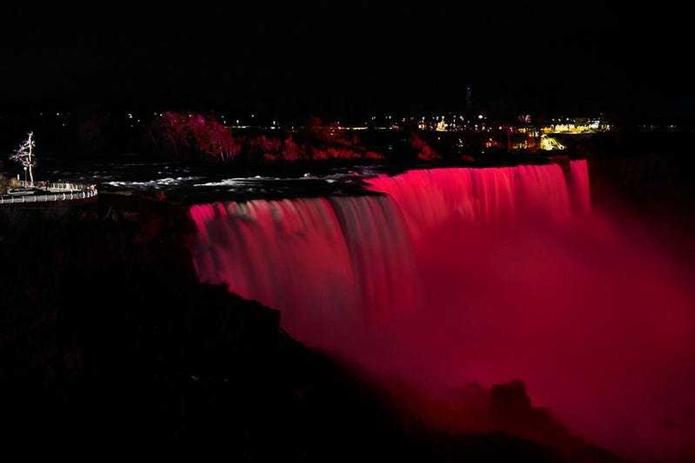 Niagra Falls lit red for World AIDS Day 2021.