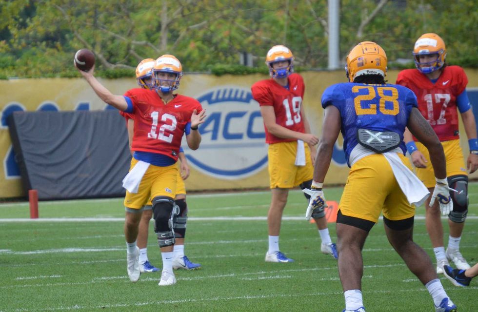 Nick Patti throwing to Kyi Wright