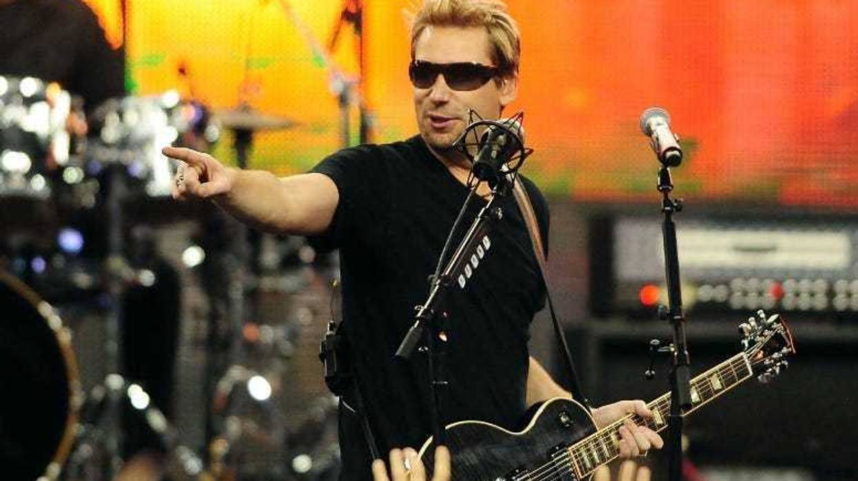 Nickelback recording artist Chad Kroeger performs during halftime of the Thanksgiving game between the Detroit Lions and the Green Bay Packers at Ford Field.
