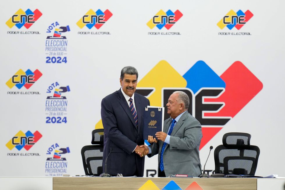 Nicolas Maduro y Elvis Amoroso