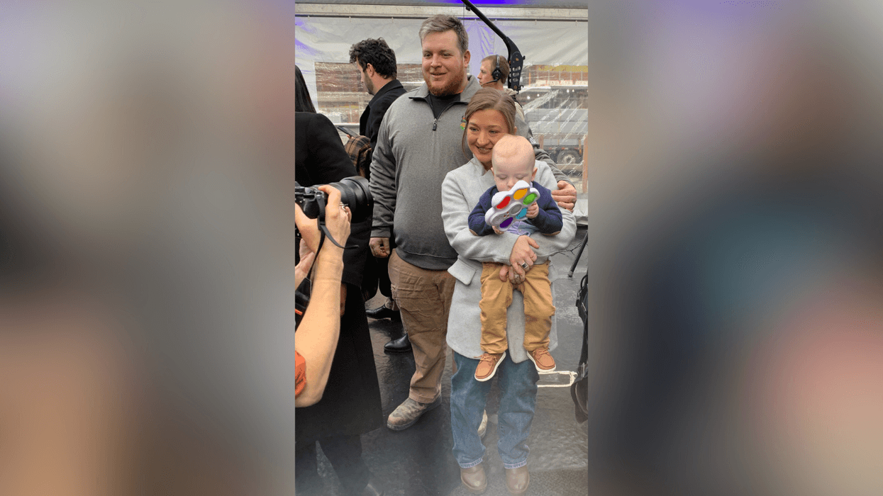 Nicole and Kyle Muldoon with their son, KJ