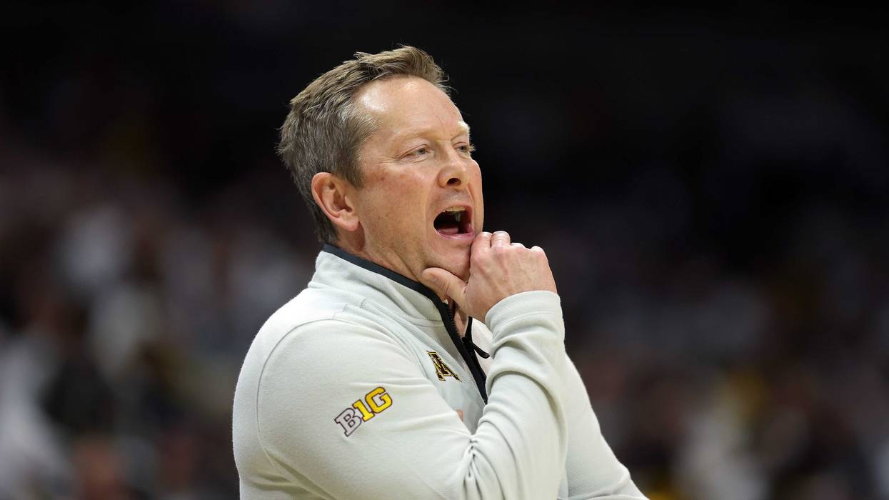 Niko Medved of the Minnesota Golden Gophers watches from the bench during the game between the Minnesota Golden Gophers and the Missouri Tigers at Mizzou Arena on November 12, 2025 in Columbia, Missouri.