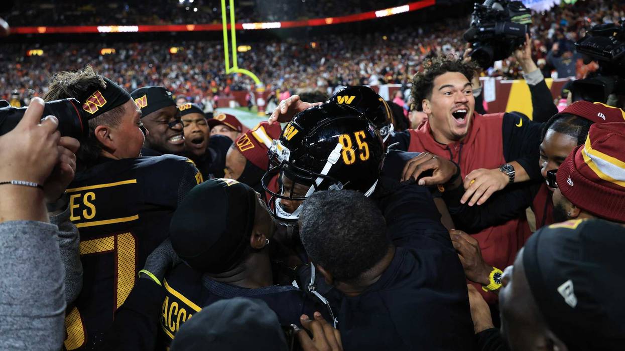 Noah Brown mobbed by teammates after win