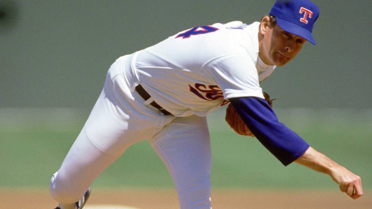 Nolan Ryan pitching from mound in 1991