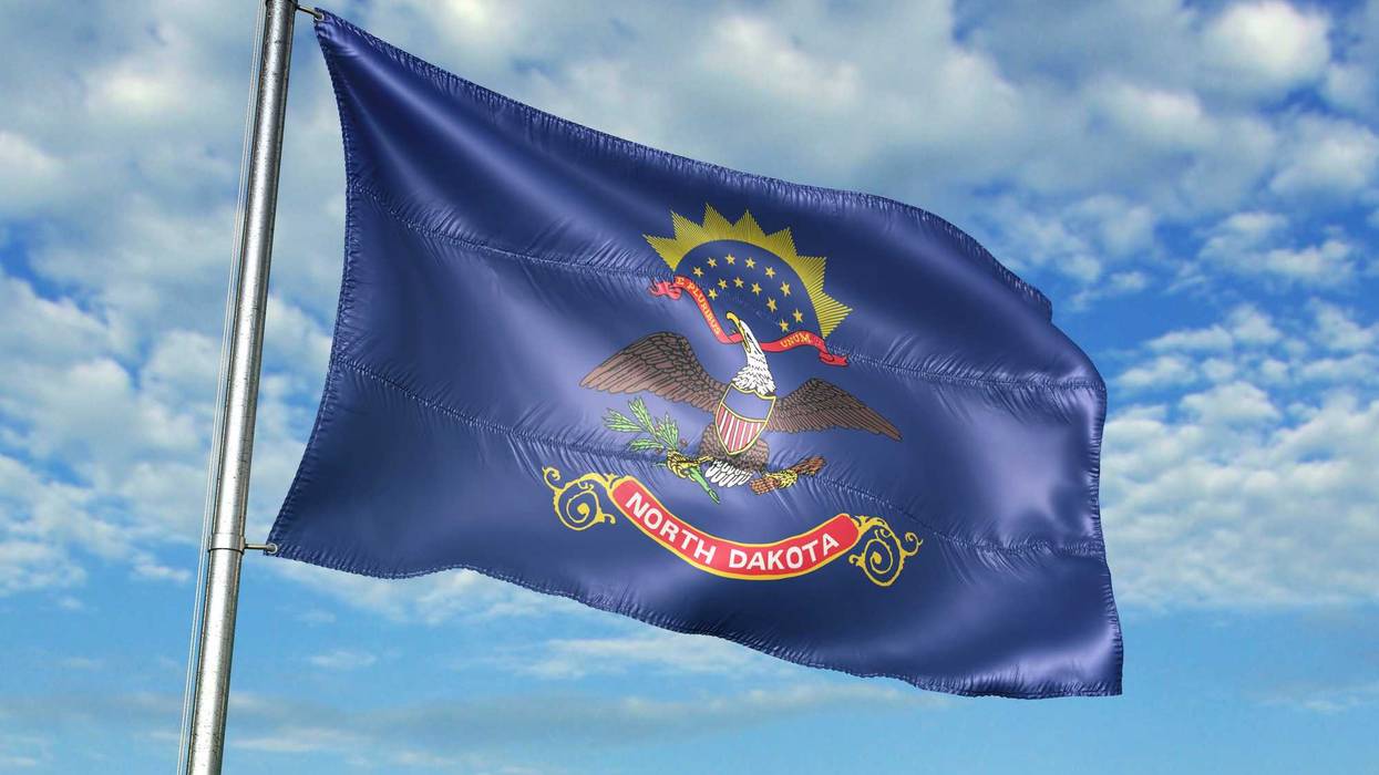 North Dakota flag at half-mast