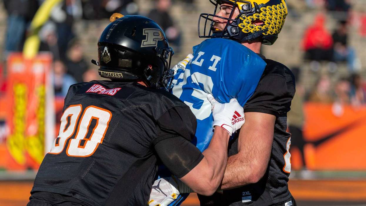 North tight end Brycen Hopkins of Purdue (89) spars with tight end Sean McKeon of Michigan (86) during Senior Bowl practice at Ladd-Peebles Stadium.