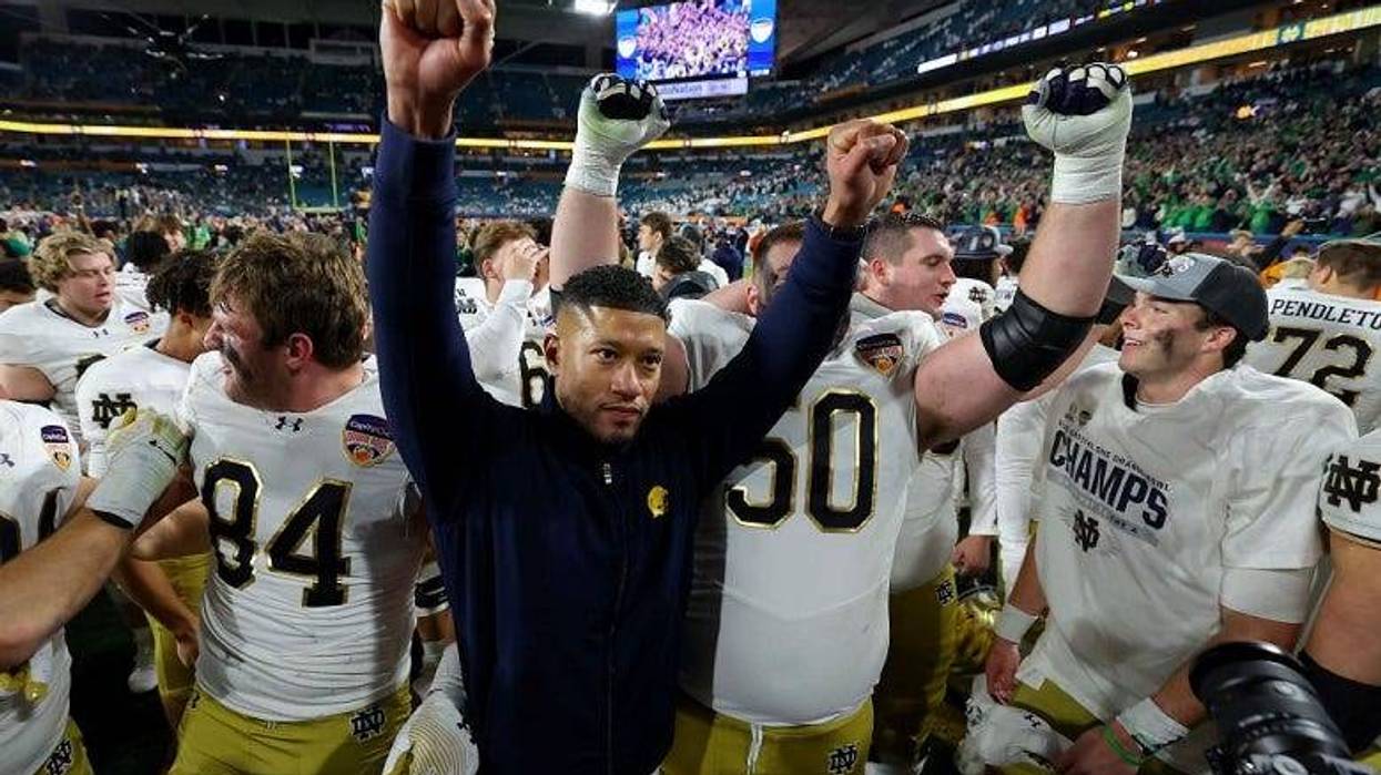 Notre Dame coach & player celebrating Orange Bowl win
