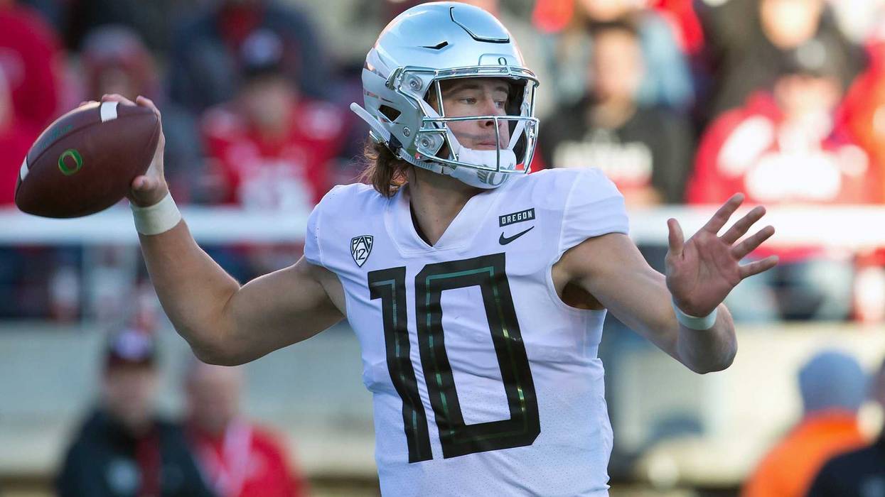 Nov 10, 2018; Salt Lake City, UT, USA; Oregon Ducks quarterback Justin Herbert (10) passes the ball during the first quarter against the Utah Utes at Rice-Eccles Stadium. Mandatory Credit: Russ Isabella-USA TODAY Sports
