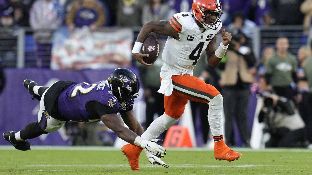 Nov 12, 2023; Baltimore, Maryland, USA; Cleveland Browns quarterback Deshaun Watson (4) runs with the ball as Baltimore Ravens defensive tackle Justin Madubuike (92) defends during the second half at M&T Bank Stadium. Mandatory Credit: Jessica Rapfogel-USA TODAY Sports