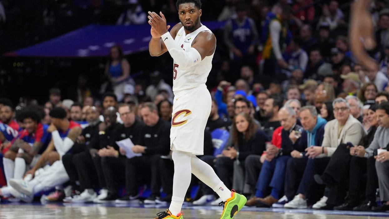 Nov 13, 2024; Philadelphia, Pennsylvania, USA; Cleveland Cavaliers guard Donovan Mitchell (45) reacts against the Philadelphia 76ers in the fourth quarter at Wells Fargo Center.