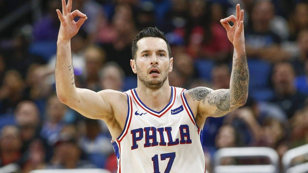 Nov 14, 2018; Orlando, FL, USA; Philadelphia 76ers guard JJ Redick (17) signals after a three-point basket during the second half against the Orlando Magic at Amway Center.