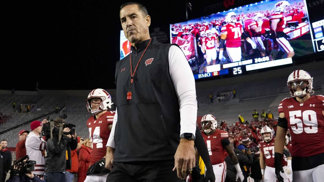 Nov 16, 2024; Madison, Wisconsin, USA; Wisconsin Badgers head coach Luke Fickell walks onto the field prior to the game against the Oregon Ducks at Camp Randall Stadium. Mandatory Credit: Jeff Hanisch-Imagn Images